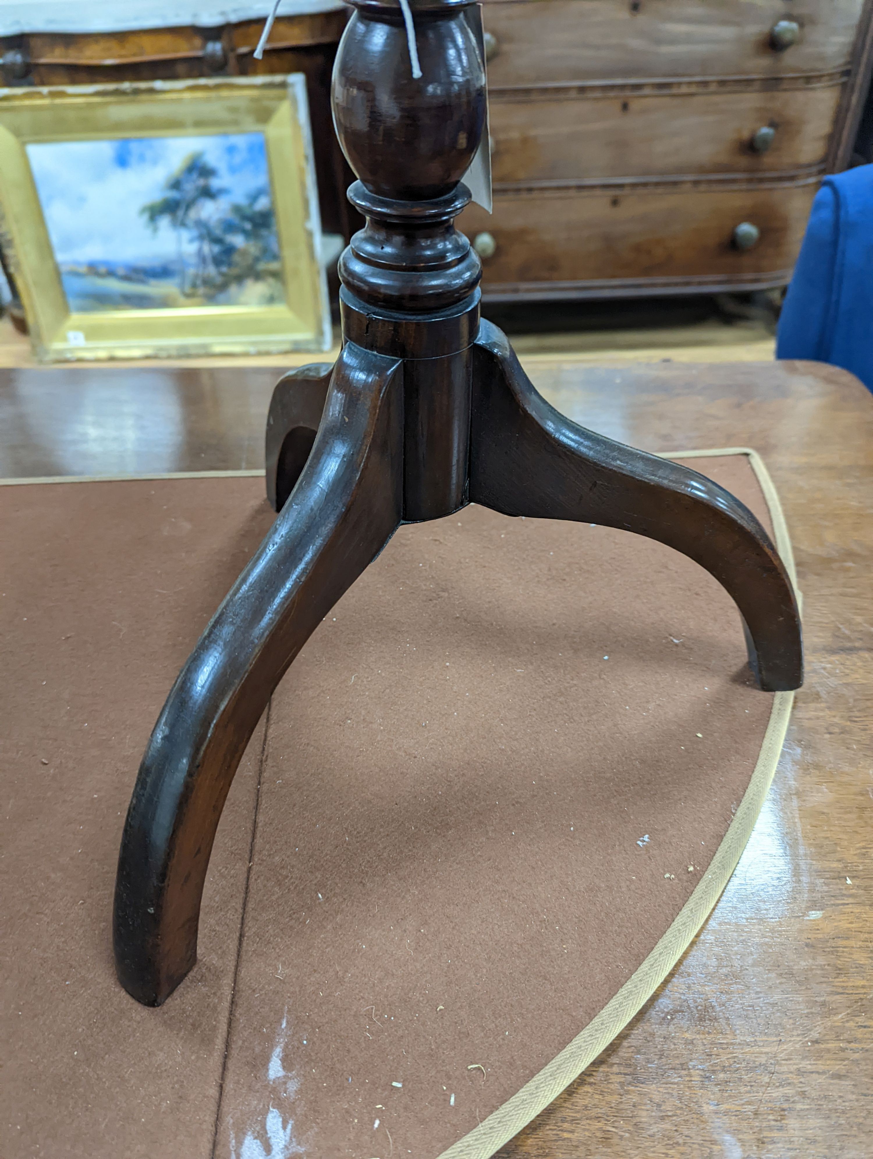 A 19th century circular mahogany tripod wine table, diameter 50cm, height 66cm